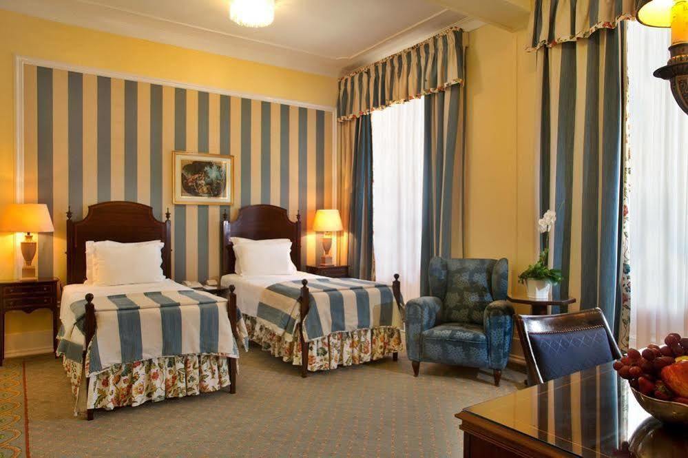 Hotel Avenida Palace Lisboa Екстериор снимка A room at the hotel