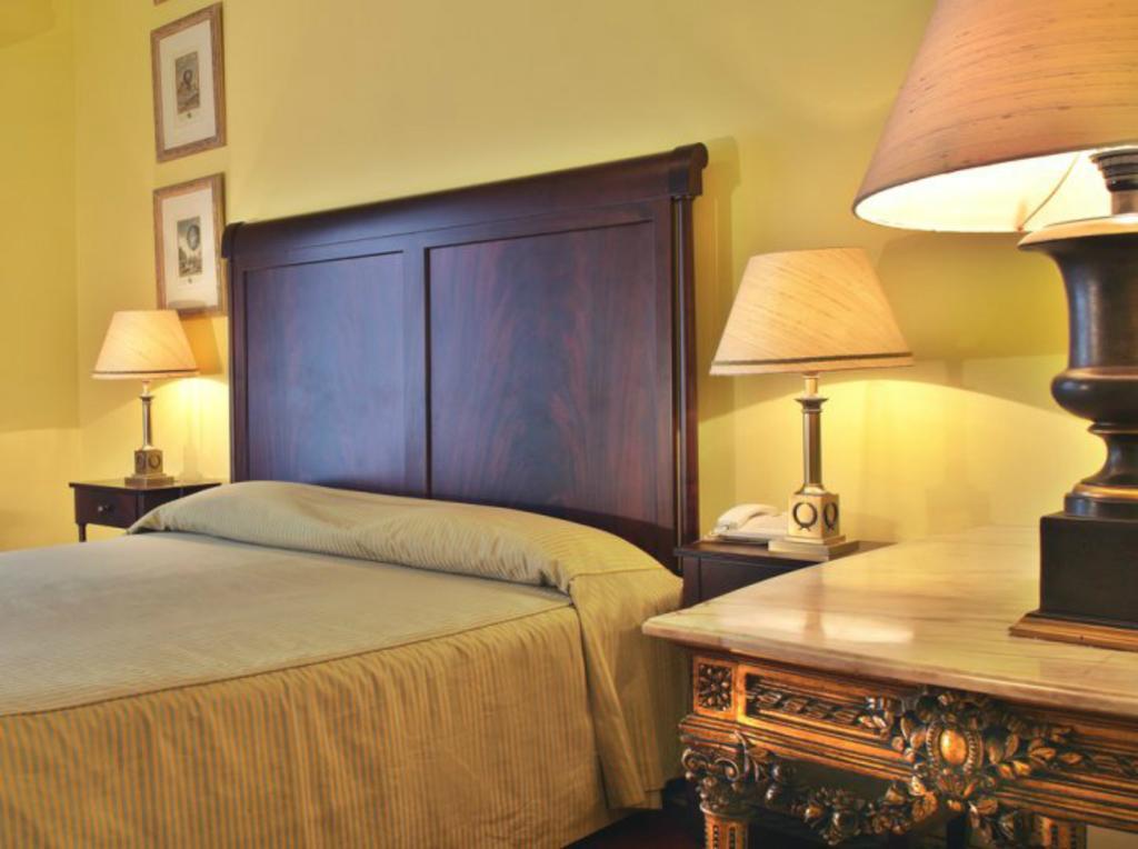 Hotel Avenida Palace Lisboa Стая снимка A bedroom at the hotel